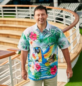Man wearing a colourful Hawaiian shirt